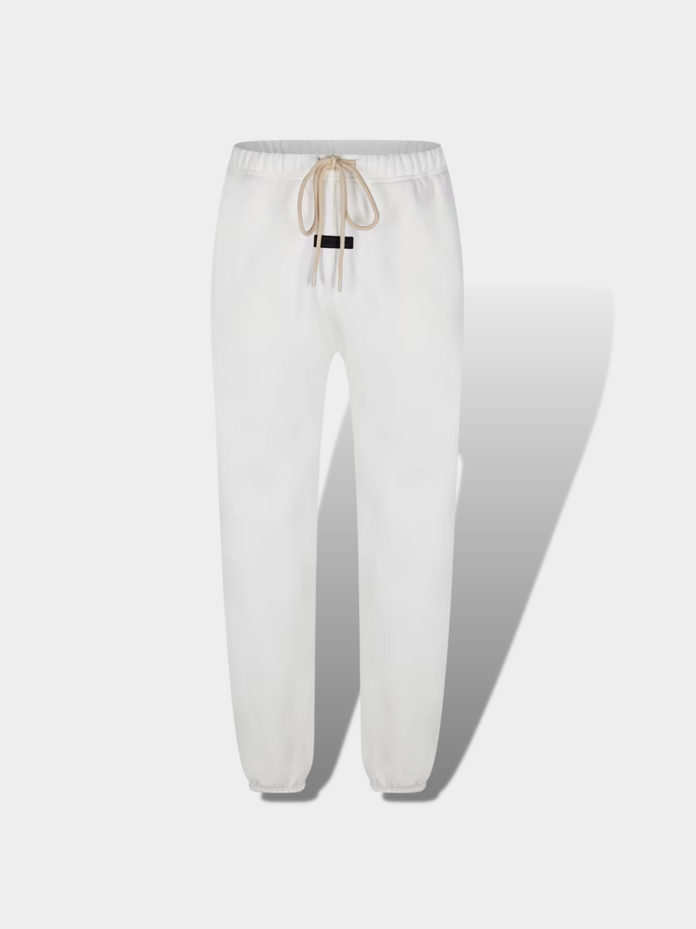 מכנסיים צבע לבן ESSENTIALS pants